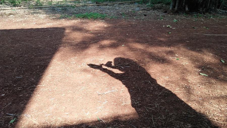 Shadow of a girl on ground